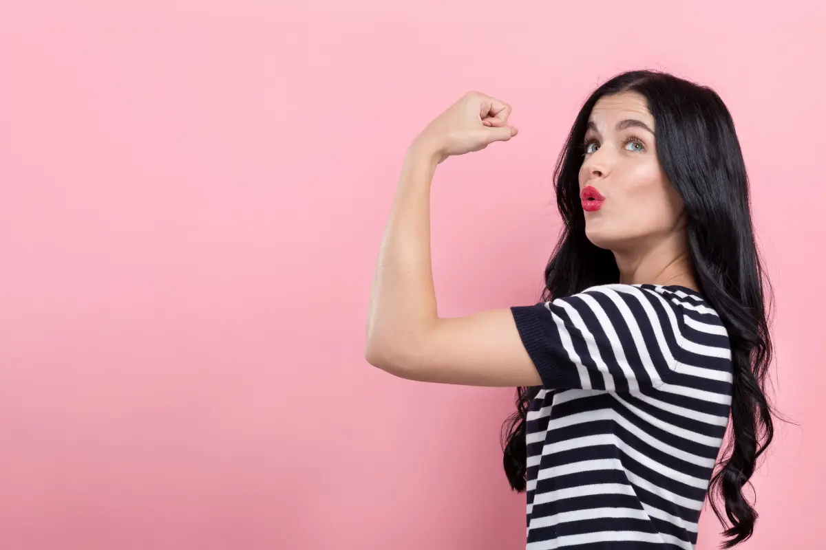 Women feeling powerful because she has powerful money habits working for her