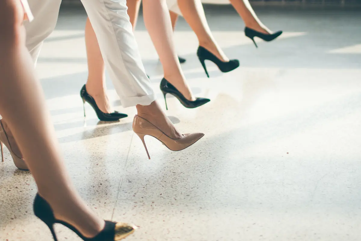 Women confidently stepping forward in high heels, representing empowerment and ambition — perfect for a blog on the 3 Best Side Hustles for Women.